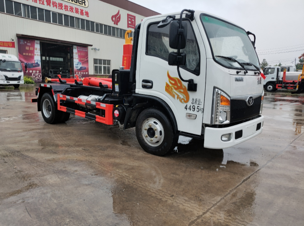 勾臂垃圾車-重汽豪曼藍(lán)牌地庫車